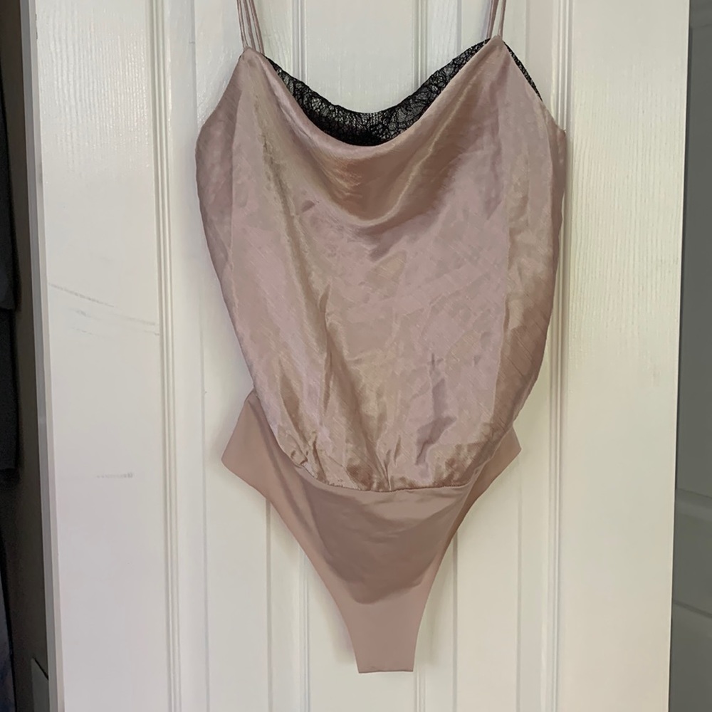 NWT (Never worn) - LUSH - Medium thong bodysuit with button closure.